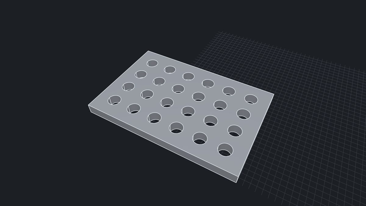 A flat plate with a grid of round holes